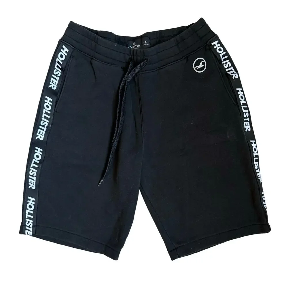HOLLISTER black shorts with white logo on sides. Size small. Gently worn.